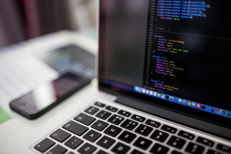 Close-up of program code on a laptop screen